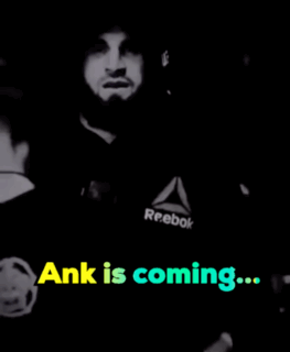 A Black And White Photo Of A Man With The Words " Ank Is Coming " GIF
