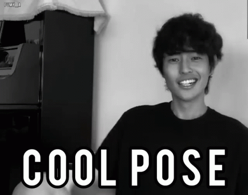 A Black And White Photo Of A Man With The Words Cool Pose Behind Him GIF