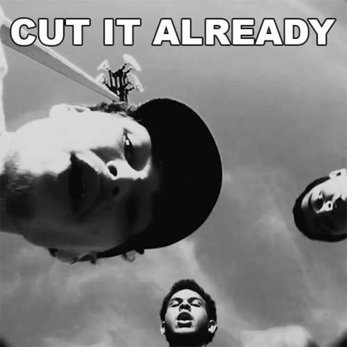 A Black And White Photo Of A Man With The Words Cut It Already Above Him GIF
