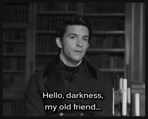 A Black And White Photo Of A Man With The Words Hello Darkness My Old Friend GIF