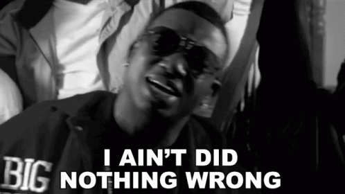 A Black And White Photo Of A Man With The Words I Ain 'T Did Nothing Wrong GIF