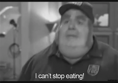 A Black And White Photo Of A Man With The Words I Can 'T Stop Eating GIF