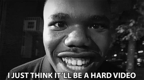 A Black And White Photo Of A Man With The Words " I Just Think It 'Ll Be A Hard Video " Below Him GIF