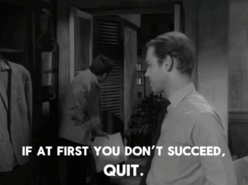 A Black And White Photo Of A Man With The Words If At First You Don T Succeed Quit GIF