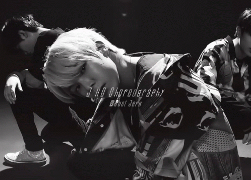 a black and white photo of a man with the words j-hd choreography just jerk on the bottom