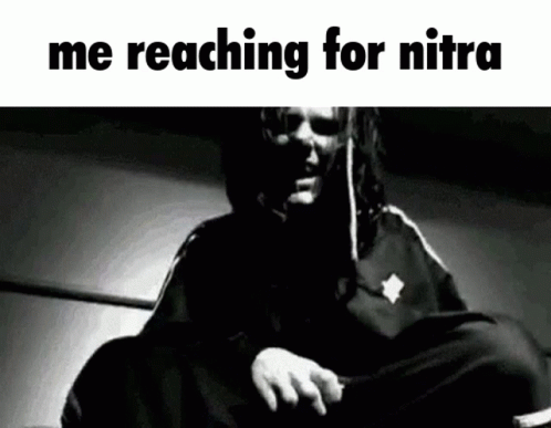 A Black And White Photo Of A Man With The Words " Me Reaching For Nitra " On The Bottom GIF