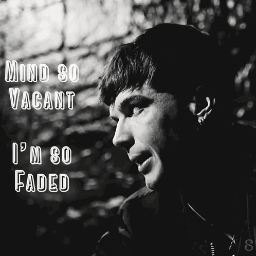 A Black And White Photo Of A Man With The Words Mind So Vacant I 'M So Faded Above Him GIF