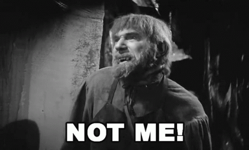 A Black And White Photo Of A Man With The Words " Not Me " On The Bottom GIF