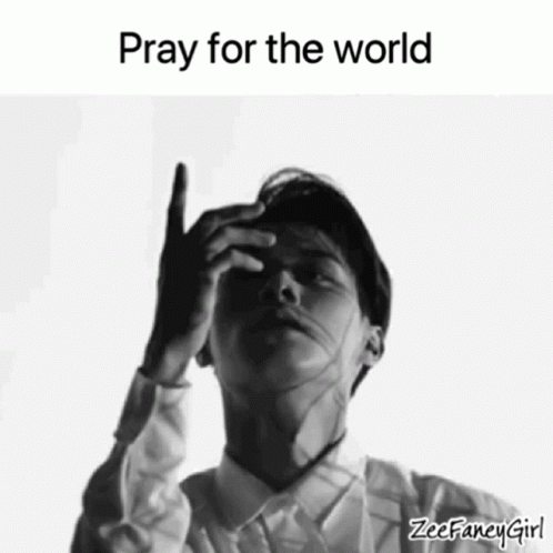 A Black And White Photo Of A Man With The Words Pray For The World GIF