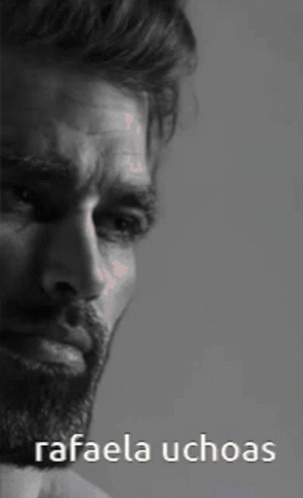A Black And White Photo Of A Man With The Words Rafaela Uchoas Below Him GIF