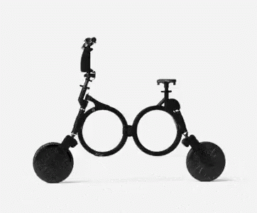 A Black And White Photo Of A Mechanical Device With A Wheel On A White Background . GIF
