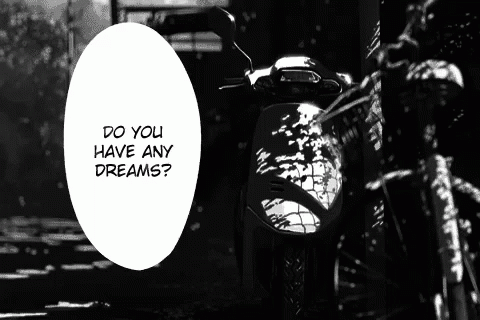 A Black And White Photo Of A Motorcycle With The Words " Do You Have Any Dreams " Above It GIF