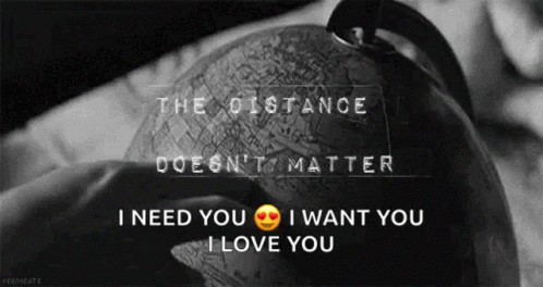 A Black And White Photo Of A Person Holding A Globe With The Words I Need You I Want You I Love You On It GIF