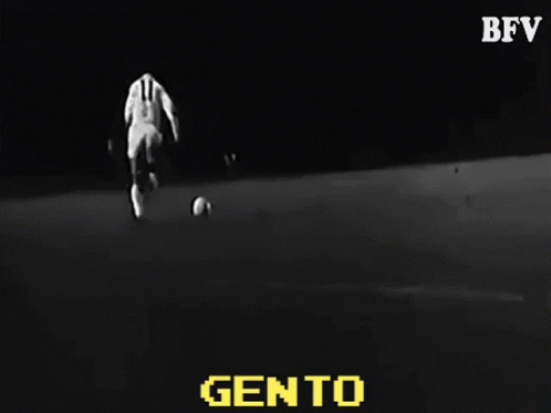 a black and white photo of a person kicking a soccer ball with the word gento in yellow