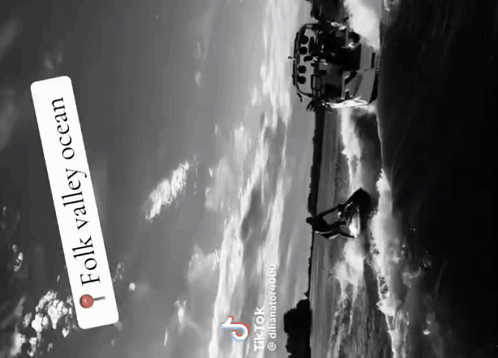 A Black And White Photo Of A Person On A Jet Ski With A Caption That Says Folk Valley Ocean GIF