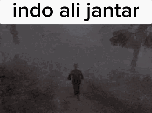 A Black And White Photo Of A Person Running With The Words Indo Ali Jantar Above GIF