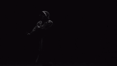 A Black And White Photo Of A Person 'S Face GIF
