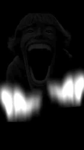 A Black And White Photo Of A Person Screaming With Their Mouth Wide Open GIF