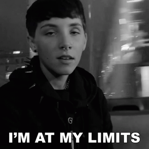 A Black And White Photo Of A Person With The Words " I 'M At My Limits " GIF