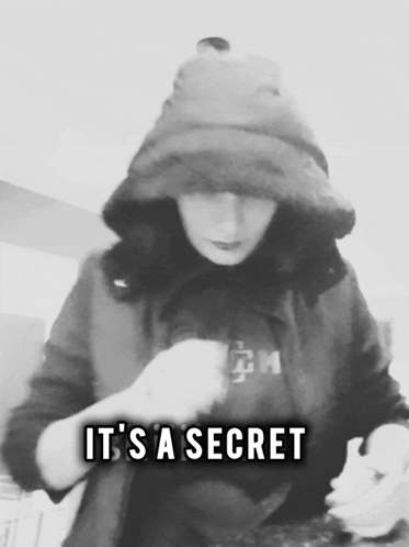 a black and white photo of a person with the words " it 's a secret "
