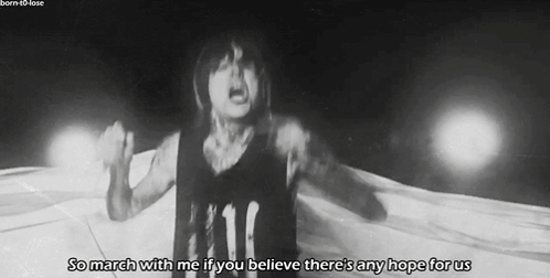 a black and white photo of a person with the words so march with me if you believe there 's any hope for us below them