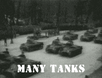 A Black And White Photo Of A Row Of Tanks With The Caption Many Tanks GIF