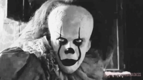 A Black And White Photo Of A Scary Clown From It GIF