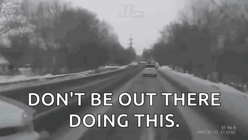 A Black And White Photo Of A Snowy Road With The Words " Don T Be Out There Doing This " GIF