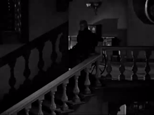 A Black And White Photo Of A Staircase With A Horse Drawn Carriage In The Background . GIF