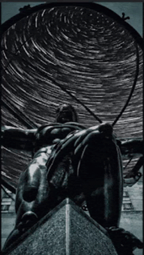 Black And White Statue Photo With Starry Sky GIF