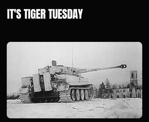 A Black And White Photo Of A Tank With The Words It 'S Tiger Tuesday GIF