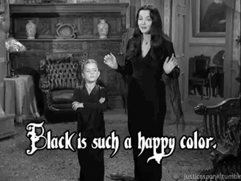 A Black And White Photo Of A Woman And A Boy Standing In A Living Room . GIF