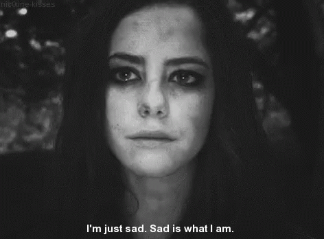 A Black And White Photo Of A Woman Crying With The Words I 'M Just Sad Sad Is What I Am GIF