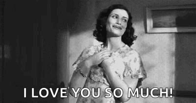 A Black And White Photo Of A Woman Holding Her Chest And Saying `` I Love You So Much ! '' GIF