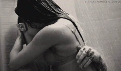 A Black And White Photo Of A Woman In A Shower With Simplymacmiller Tumblr Written On The Bottom Right GIF