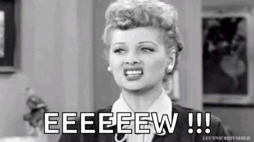A Black And White Photo Of A Woman Making A Funny Face And The Words Eeeeew !!! GIF