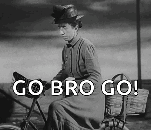 A Black And White Photo Of A Woman Riding A Bike With The Words Go Bro Go Written On It GIF