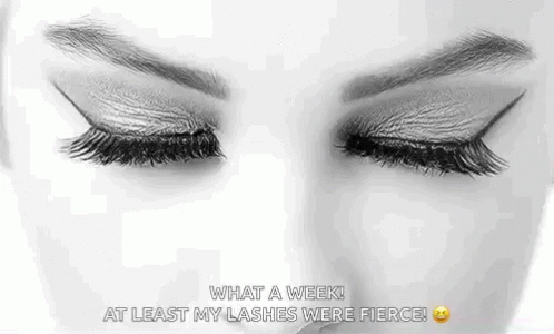 A Black And White Photo Of A Woman 'S Eyes With Long Eyelashes And A Quote . GIF