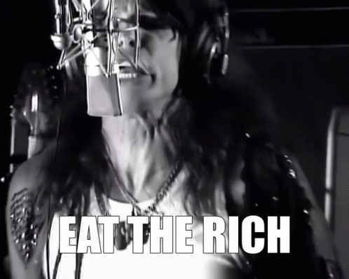 A Black And White Photo Of A Woman Singing Into A Microphone With The Caption Eat The Rich GIF