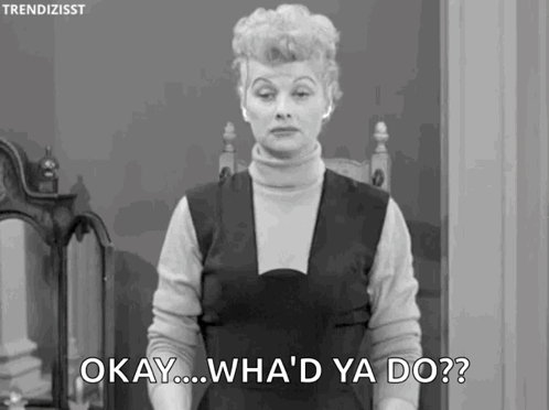A Black And White Photo Of A Woman Standing In Front Of A Mirror And Saying `` Okay ... Wha 'D Ya Do ? '' GIF