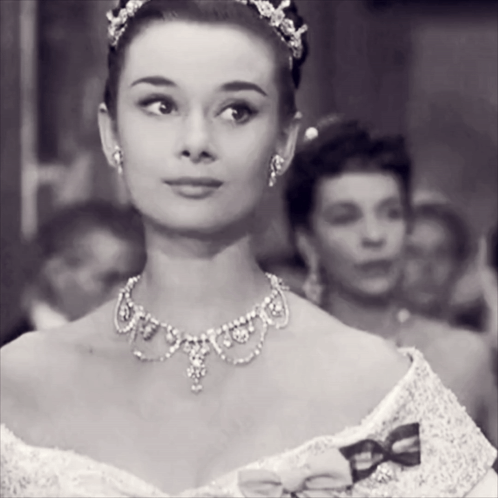 Black And White Woman With Necklace And Tiara GIF