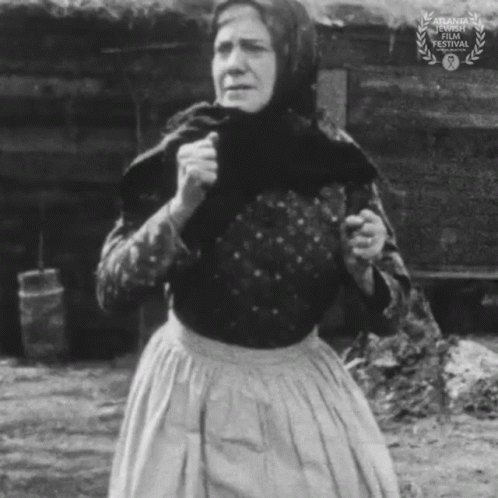 A Black And White Photo Of A Woman With A Laurel Wreath On The Bottom GIF