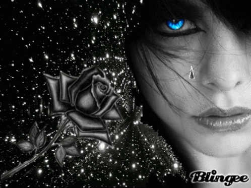 A Black And White Photo Of A Woman With A Rose And A Tear Coming Out Of Her Eye GIF