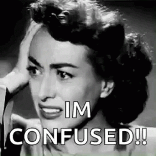 A Black And White Photo Of A Woman With Her Hand On Her Head And The Words `` Im Confused ! '' GIF