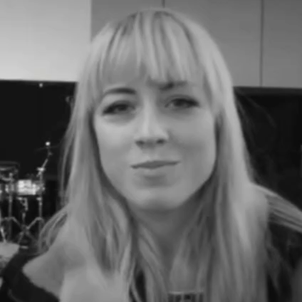 A Black And White Photo Of A Woman With Long Blonde Hair GIF