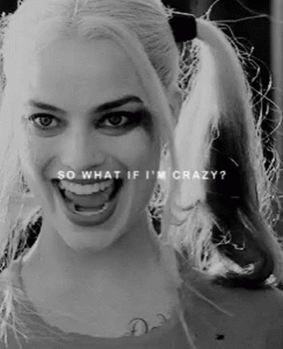 A Black And White Photo Of A Woman With Pigtails And The Words `` So What If I 'M Crazy ? '' GIF