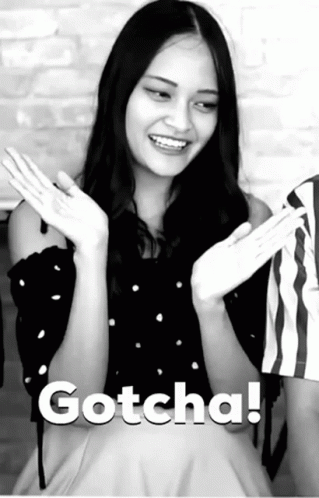 A Black And White Photo Of A Woman With The Word Gotcha Written On The Bottom GIF