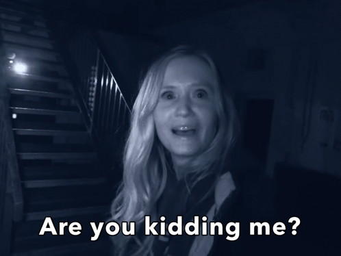 A Black And White Photo Of A Woman With The Words " Are You Kidding Me " Below Her GIF