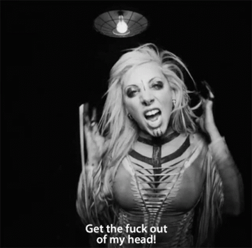 A Black And White Photo Of A Woman With The Words " Get The Fuck Out Of My Head " GIF