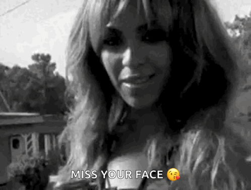 A Black And White Photo Of A Woman With The Words `` Miss Your Face '' Written Above Her . GIF